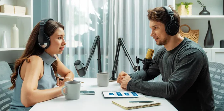 Man and woman doing a podcast